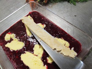 I like to slide them on a knife to prevent breaking. But if you break them, it really doesn't matter. Just kinda piece it together. That is the beauty of cobbler.