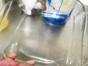 Now pour a little oil into the 8 inch square pyrex and swirl it around....