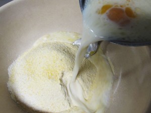 Slowly pour the milk mix into the cornmeal mix...